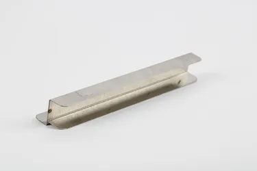 Fixing plate for topping unit